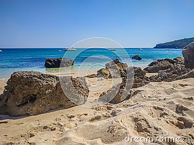 Galapos beach with yachts on the horizon in Natural Park of Serra da Arrábida, Setúbal PORTUGAL Stock Photo