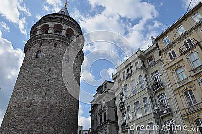 Galata tower between houses, Istanbul, Turkey Stock Photo