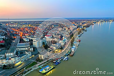 Galati, ROMANIA - March 19, 2021: Aerial view of Galati City, Romania. Danube River near city with sunset warm light Editorial Stock Photo