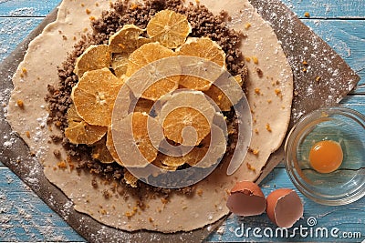 Galette dough with walnuts and orange Stock Photo