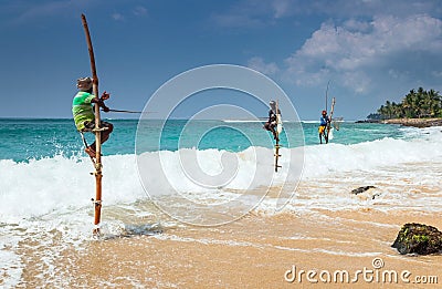 Galle, SRI LANKA. The local fishermen are fishing in unique style. Editorial Stock Photo