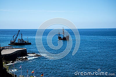 Galleon off Camara de Lobos is a fishing village near the city of Funchal and has some of the highest cliffs in the world Editorial Stock Photo