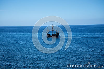 Galleon off Camara de Lobos a fishing village near the city of Funchal and has some of the highest cliffs in the world Editorial Stock Photo