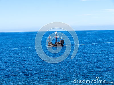 Galleon off Camara de Lobos a fishing village near the city of Funchal and has some of the highest cliffs in the world Editorial Stock Photo