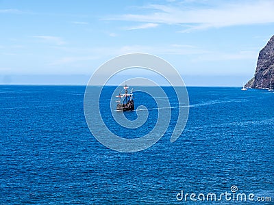 Galleon off Camara de Lobos a fishing village near the city of Funchal and has some of the highest cliffs in the world Editorial Stock Photo