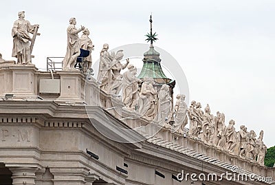 Gallery of saints, fragment of colonnade of St. Peters Basilica, Rome Stock Photo