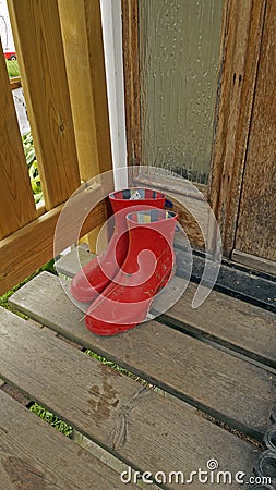 Galoshes on the porch Stock Photo