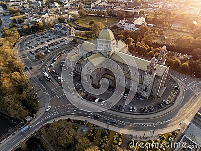 Galway Cathedral building at sunset. Aerial drone view, Warm light, Galway town, Ireland, Popular landmark Stock Photo