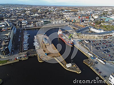 Aerial view on the Galway city commercial port and the Long Walk. Editorial Stock Photo