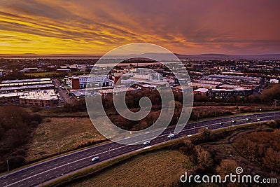 Galway, Ireland - 02.08.2023: N 6 main road at stunning sunset. Aerial drone view. Rich saturated color. Transportation and Editorial Stock Photo