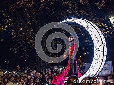 Galway, Ireland -29.10.2023: Scene at Macnas Halloween parade at Salmon Weir Bridge, Cathedral building in the background. Show Editorial Stock Photo