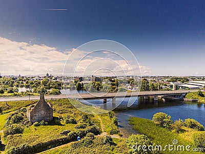 06/21/2019 Galway, Ireland: Terryland castle, Bridge over river Corrib, Galway city aerial view, cloudy sky, sunny day Editorial Stock Photo