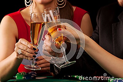 Gambling champagne cheers Stock Photo