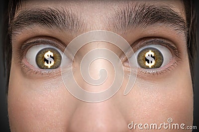 Gambling concept. Young man has dollar signs in his eyes Stock Photo