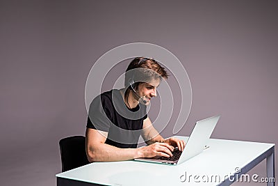 Gambling or gaming in the office excited young businessman addicted to computer happy man looks. Gaming concept Stock Photo