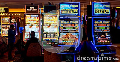 Gambling in the night & wins by Las Vegas. Nevada, earn easy money. Editorial Stock Photo