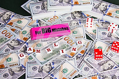 Gambling: Pink eraser with really big mistakes message, dice and scattered and stacked US dollars Stock Photo
