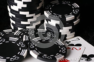 Game chips and worst possible poker hand Stock Photo