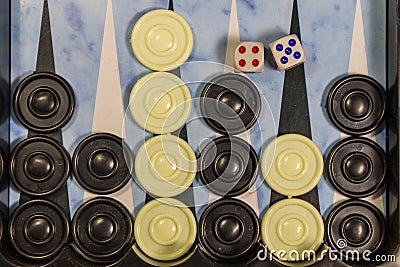 Game field in a backgammon with dice and checkers Stock Photo