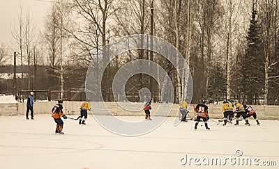 Game of hockey on ice platform under opened by sky Editorial Stock Photo