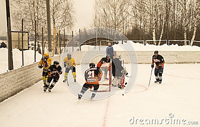 Game of hockey on ice platform under opened by sky Editorial Stock Photo