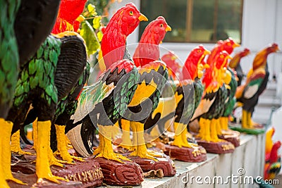 Gamecocks Statue in thai temple for redeem a vow to a god, nati Stock Photo