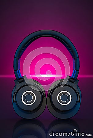 Gamer Headphones Dark Background and colorful pink Light. Stock Photo