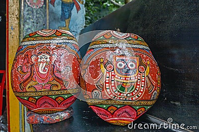 Ganesh and Jagannath Painting on Coconut shell by Odisha folk Artist Editorial Stock Photo
