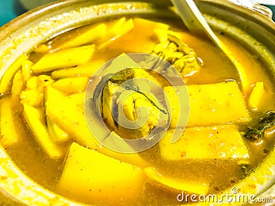 Gang Som, Yellow Curry Soup with Bamboo Shoot and Sea Bass Fish, Sour soup made of Tamarind Paste or Turmeric Stock Photo