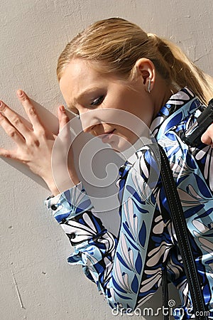 Gangster holds woman at gunpoint Stock Photo