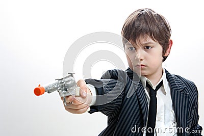Gangster kid targeting someone Stock Photo