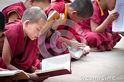 GANGTOK, SIKKIM, INDIA - AUG 19: An Unidentified Tibetan lama pr Editorial Stock Photo