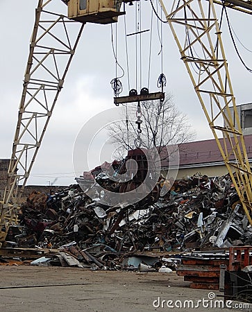 Grabber Crane Machine Loading Rusty Metal Scrap On The Scrapyard Stock Photo