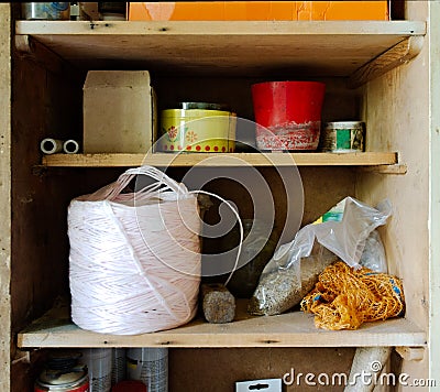 Garage cabinet with clutter Stock Photo