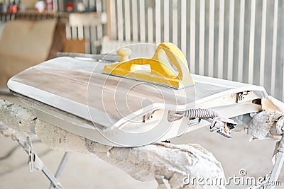 Garage painting car service. door section of the car is covered with primer. Repairing car body work after the accident Stock Photo