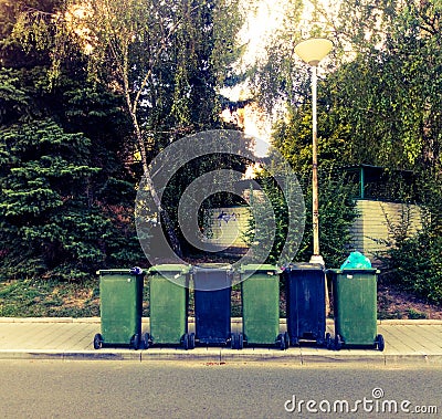 Garbage cans on the road Stock Photo