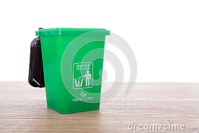 Garbage classification green kitchen waste bin model.The Chinese characters on the trash can mean `Kitchen waste` and `Everyone is Stock Photo