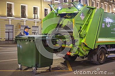 Garbage collector. An employee of the city municipal garbage. Editorial Stock Photo