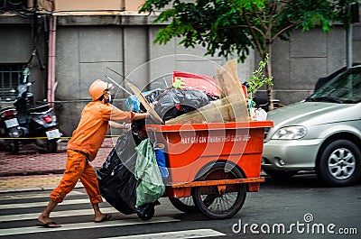 Garbage collector in Ho Chi Minh City, Vietnam Editorial Stock Photo