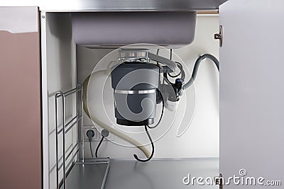 Garbage Disposal under the modern sink, waste chopper concept Stock Photo