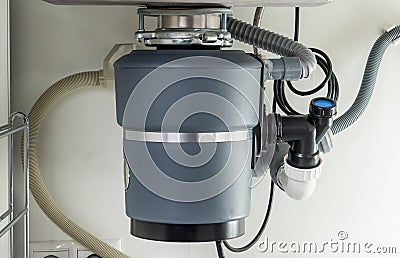 Garbage Disposal under the modern sink, waste chopper concept Stock Photo