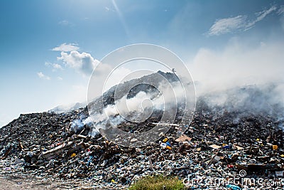 Garbage dump landscape full of litter, plastic bottles,rubbish and other trash at the Thilafushi tropical island Stock Photo