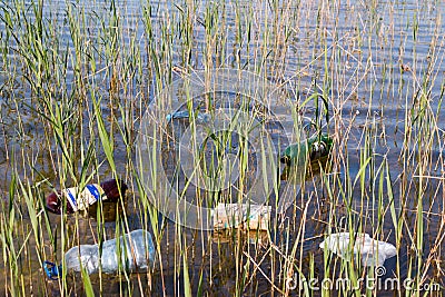 Garbage in the lake closeup Stock Photo