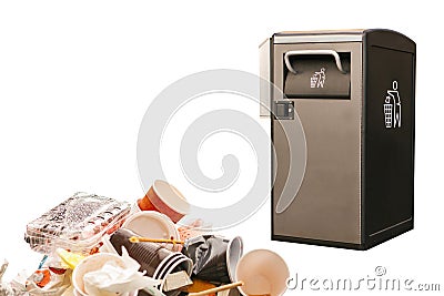 Garbage next to a modern garbage can. The concept is protected by nature and the environment Stock Photo