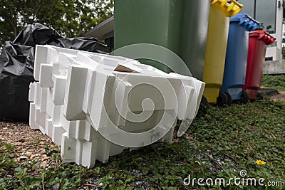 A garbage and recycle trash can with unuse white foam cushioning material Stock Photo