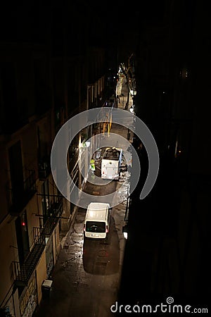 Garbage truck pass on a central street in barcelona Editorial Stock Photo