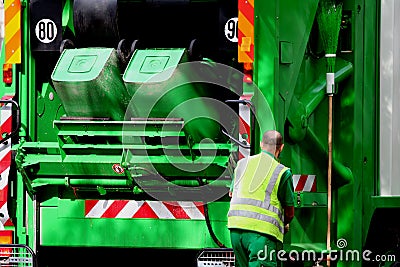 Garbage truck and worker Stock Photo