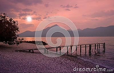 Garda lake beach in romantic moonlight scenery Stock Photo