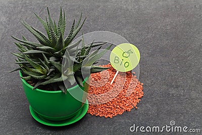 Garden background with mineral fertilizers balls. Complex mineral fertilizer with sodium, phosphorus for flowers, plant, tree Stock Photo