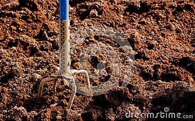 Garden Claw And Soil Stock Photo